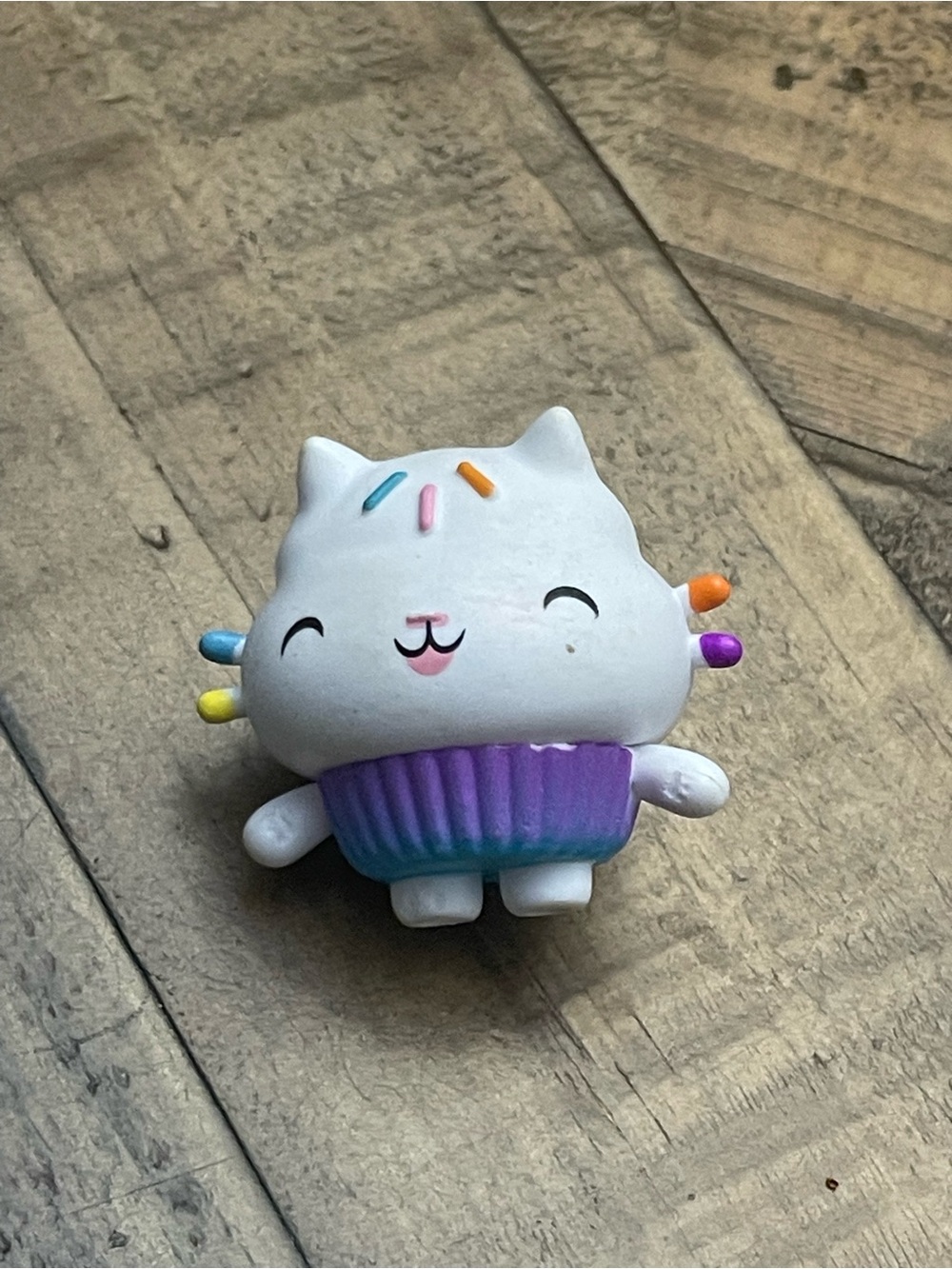 mini toy figure of Cakey Cat (also known as Cakey's Cupcake Cat)